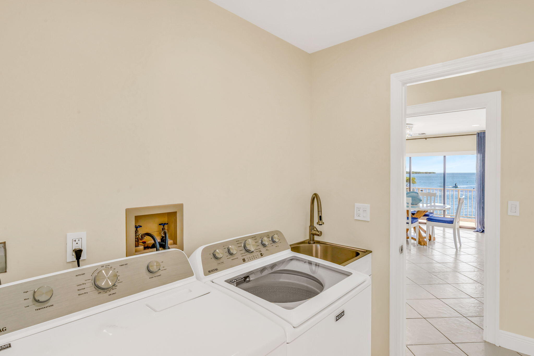 33 Kyle Way West Marathon, FL 33050 - Photo 25 of 44 a room with a sink and a bed