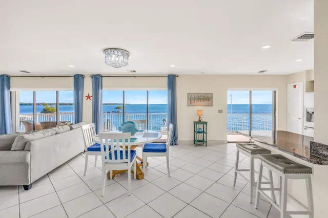 a kitchen with granite countertop appliances cabinets and a sink