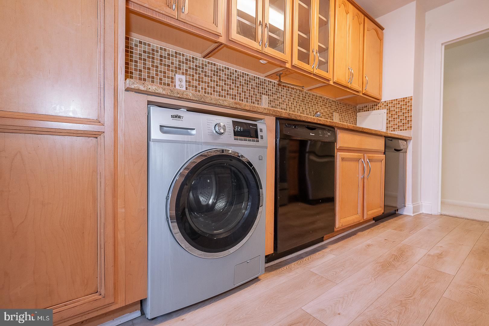 20 Conshohocken State Road, Unit 203 Bala Cynwyd, PA 19004 - Photo 15 of 35 a view of a storage & utility room with washer and dryer