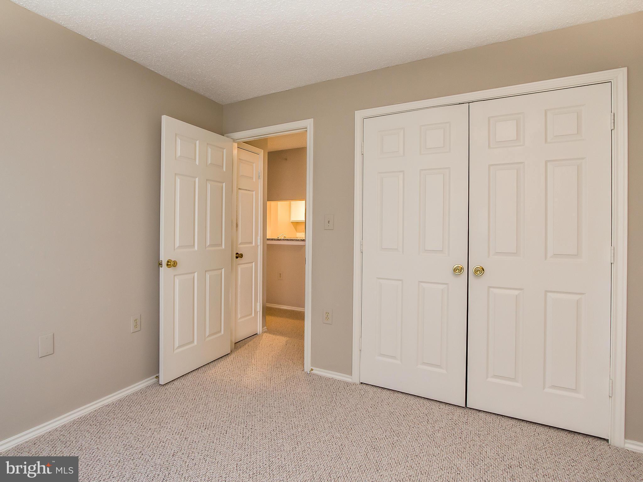 20991 Timber Ridge Terrace, Unit 303 Ashburn, VA 20147 - Photo 22 of 30 Bedroom