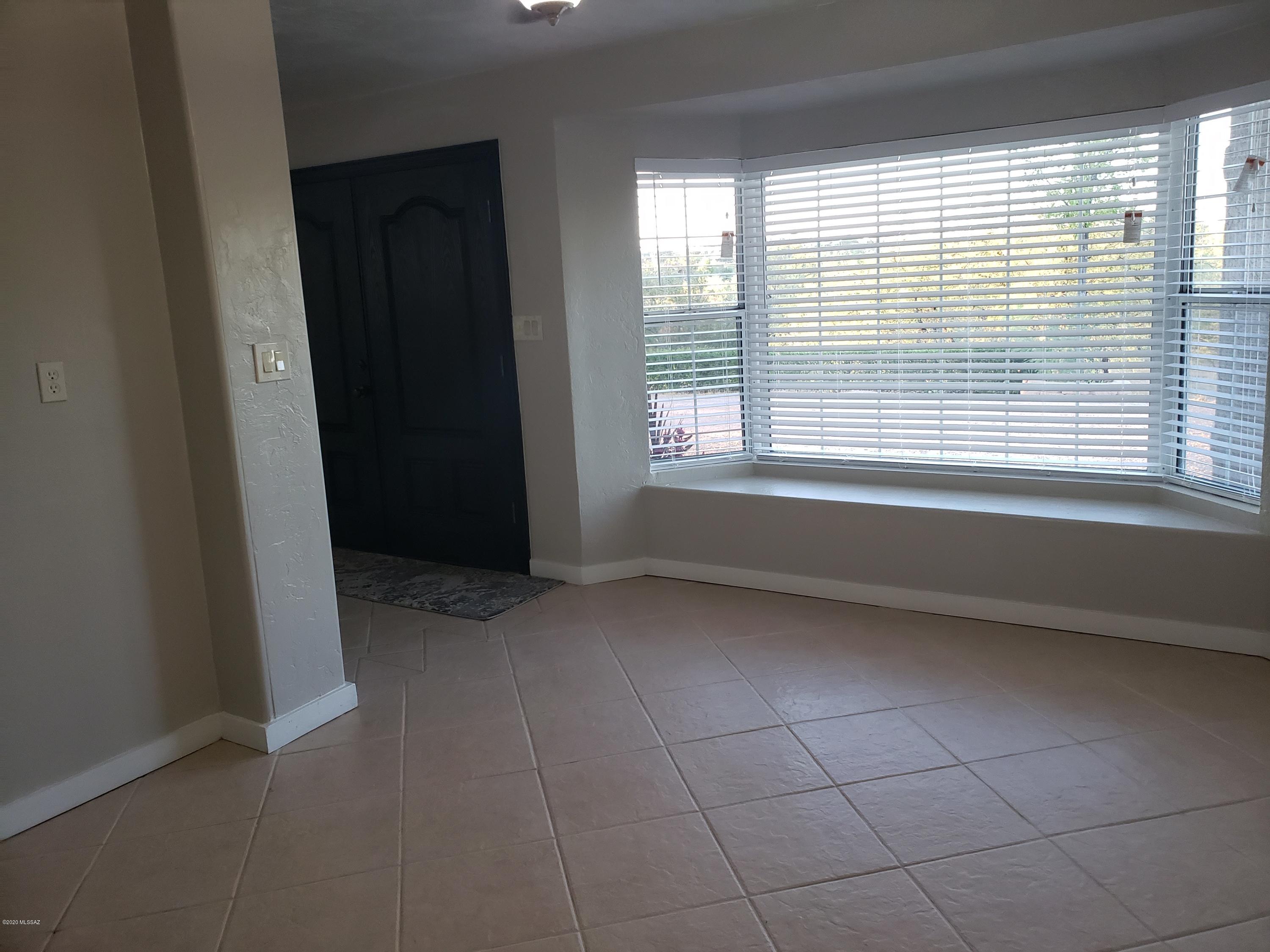182 Pita Court Rio Rico, AZ 85648 - Photo 28 of 46 a view of an empty room with a window