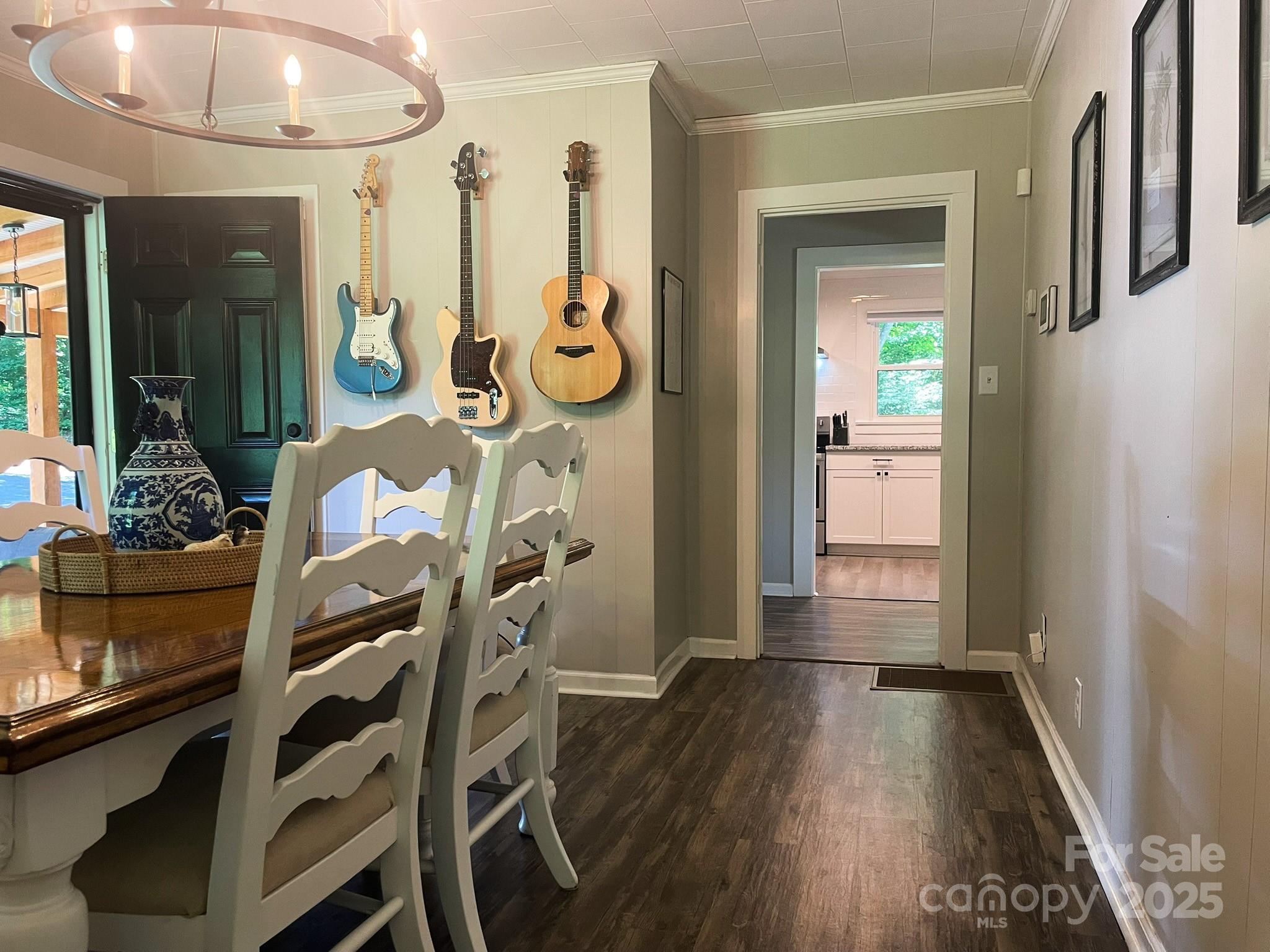 107 Byrd Street Morganton, NC 28655 - Photo 11 of 46 a dining room with furniture and wooden floor