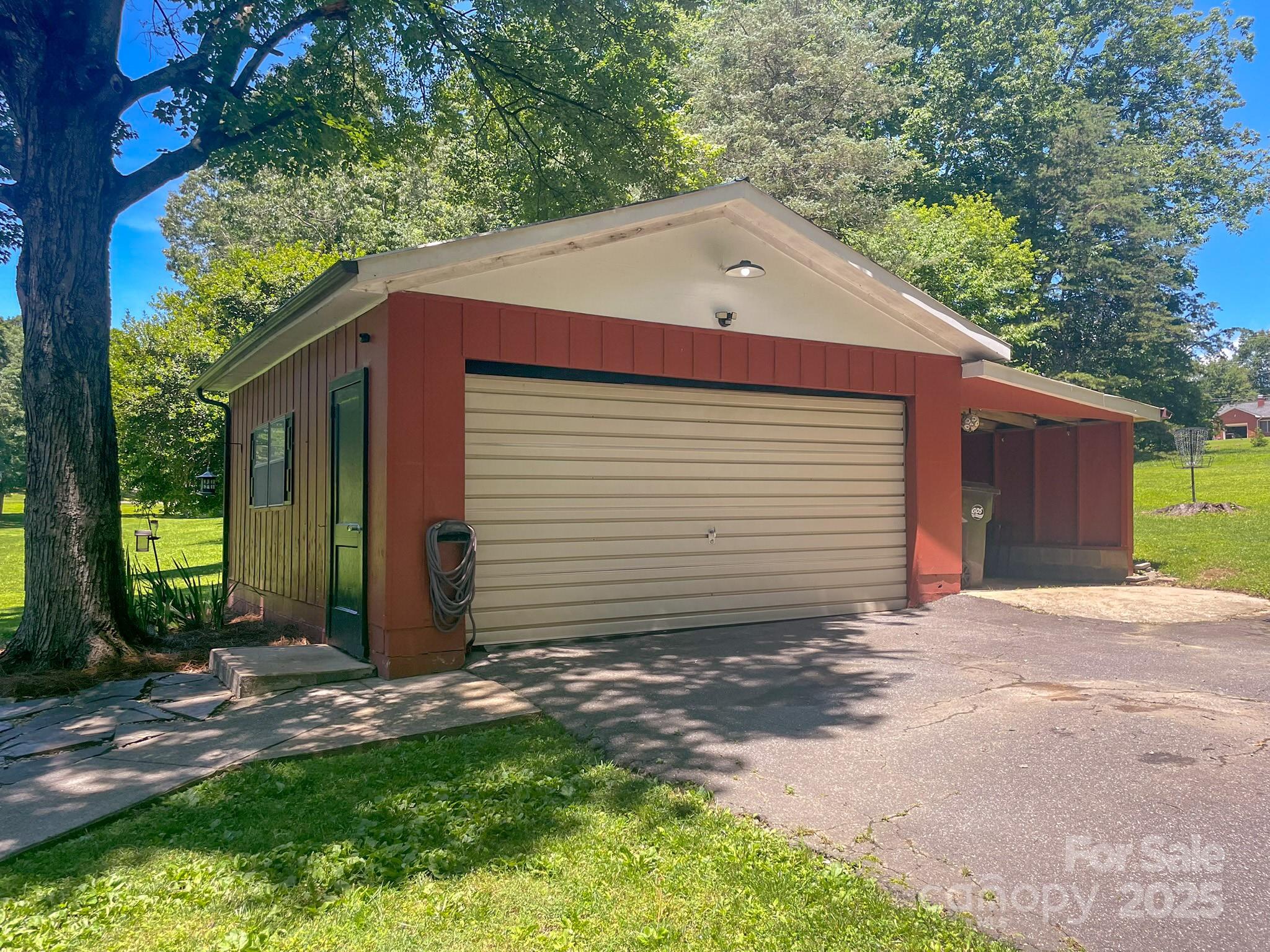 107 Byrd Street Morganton, NC 28655 - Photo 27 of 46 a front view of a house with a yard
