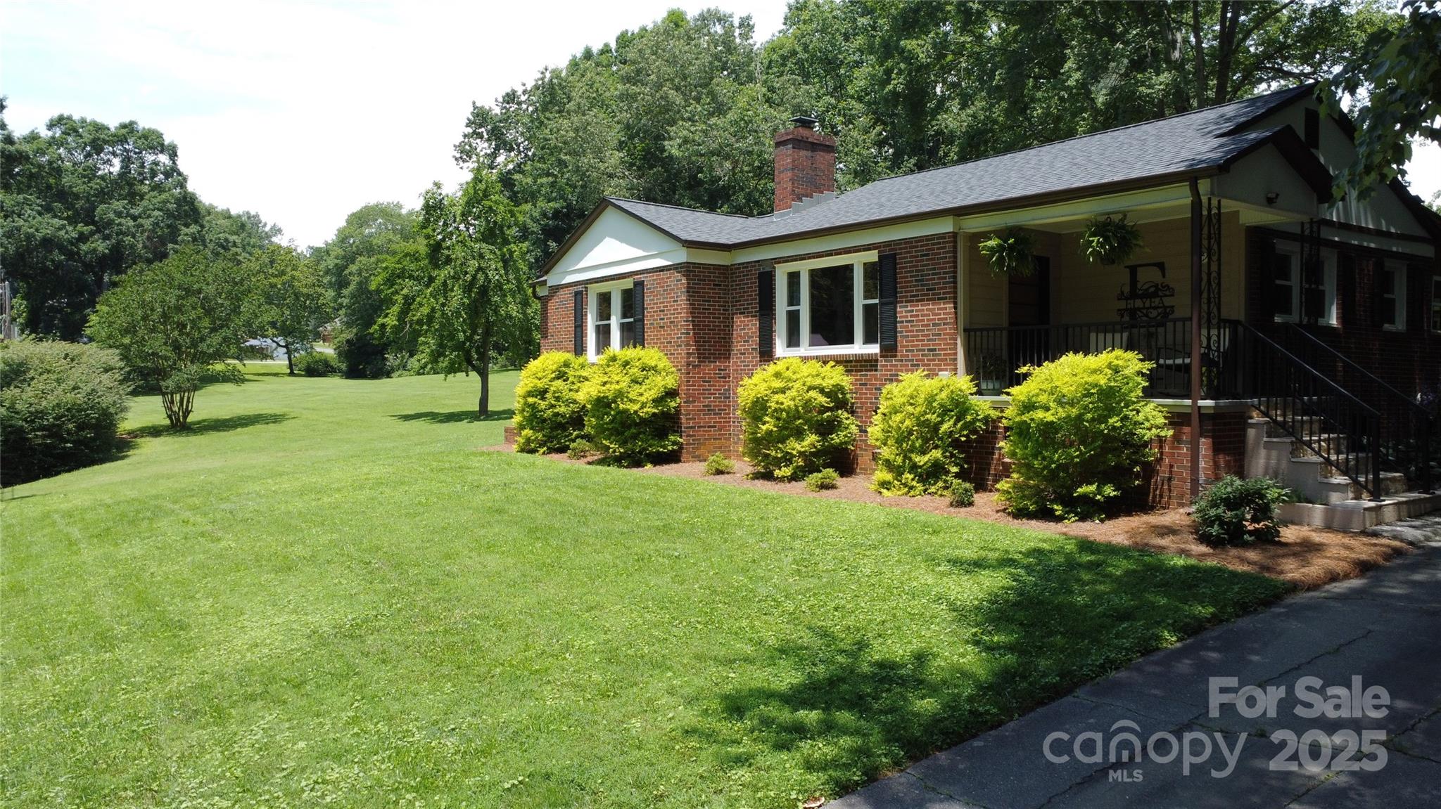 107 Byrd Street Morganton, NC 28655 - Photo 38 of 46 a front view of house with yard and green space
