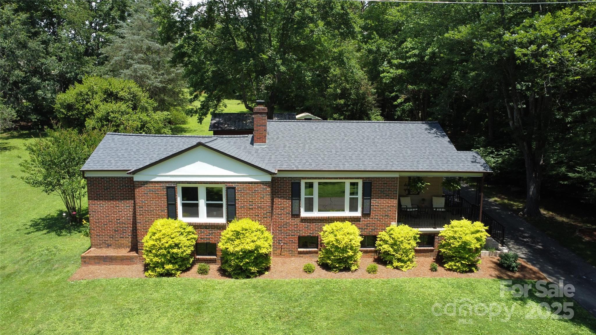 107 Byrd Street Morganton, NC 28655 - Photo 40 of 46 front view of a house with a yard