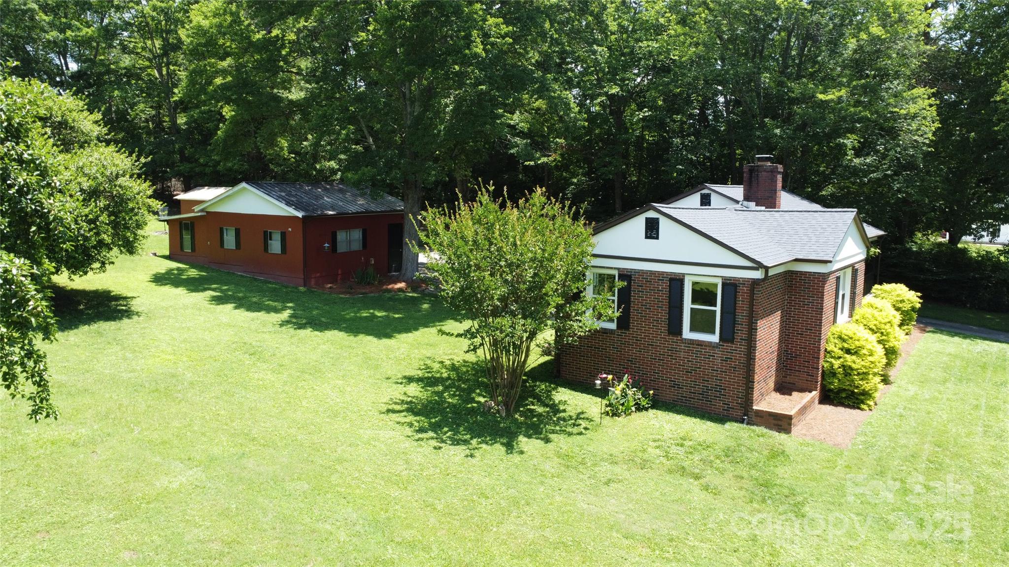 107 Byrd Street Morganton, NC 28655 - Photo 41 of 46 a front view of a house with a yard