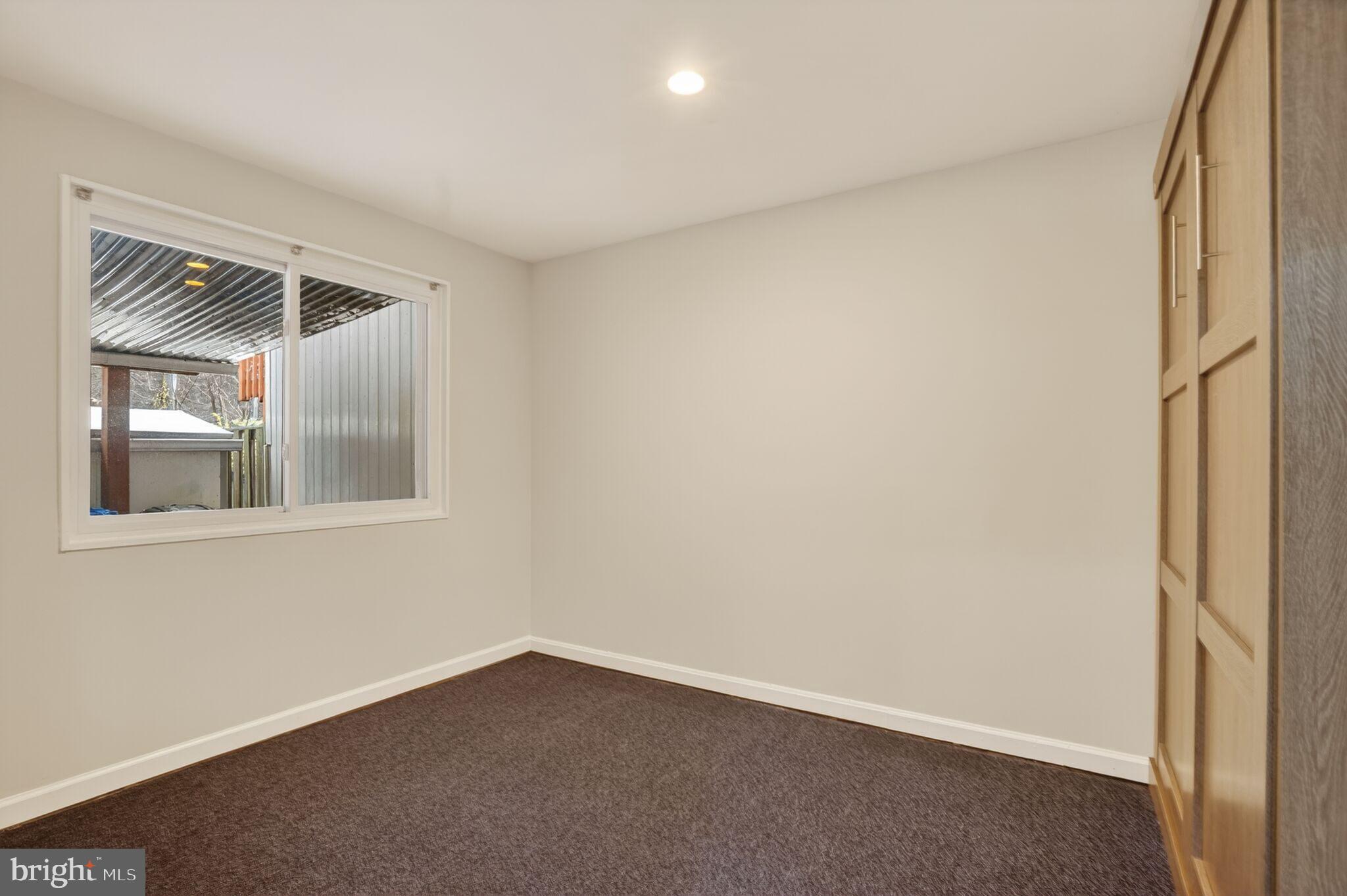3052 Sugar Lane Vienna, VA 22181 - Photo 23 of 28 an empty room with a window