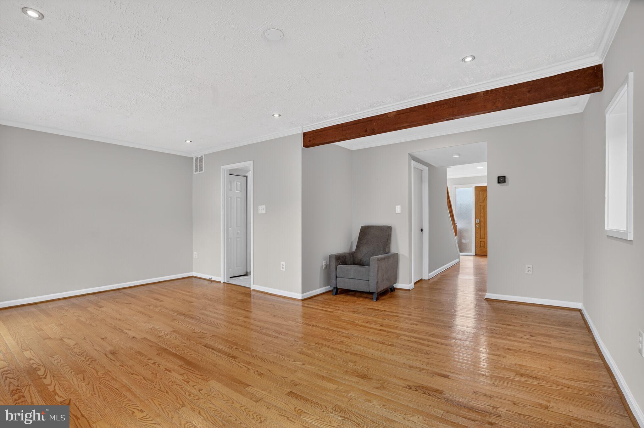 3052 Sugar Lane Vienna, VA 22181 - Photo 10 of 28 a view of livingroom with furniture and wooden floor