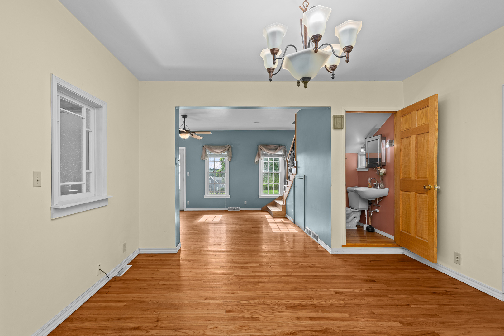802 North High Street Port Byron, IL 61275 - Photo 17 of 43 a view of an empty room with wooden floor