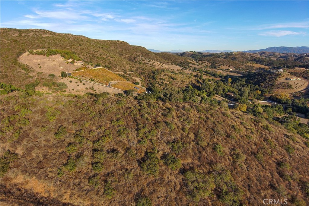 0 Via Las Rocas Temecula, CA 92590 - Photo 6 of 13 a view of a mountain range in a cloudy sky
