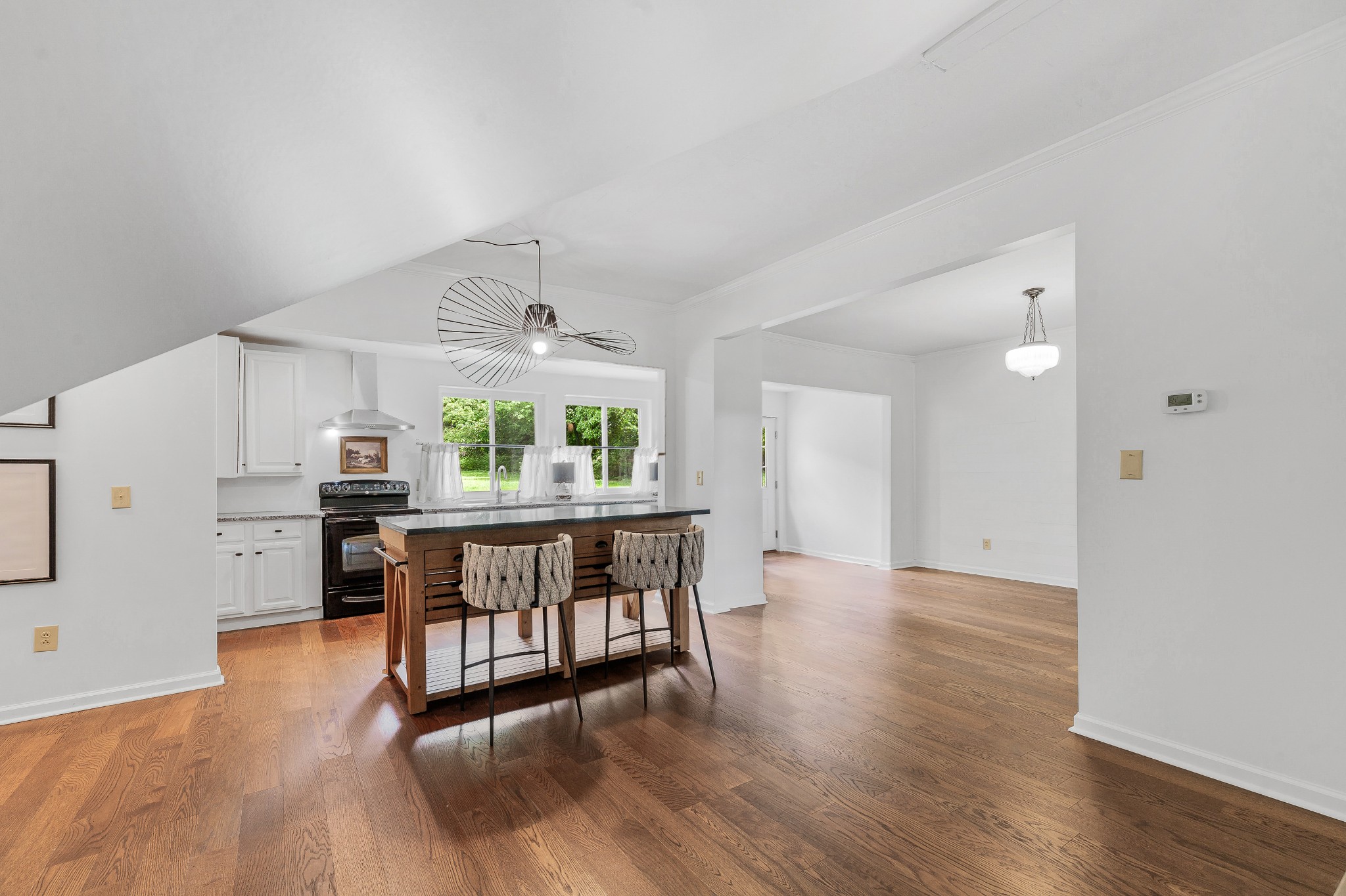 128 North Main Street Loretto, TN 38469 - Photo 12 of 32 a view of a livingroom with furniture and wooden floor