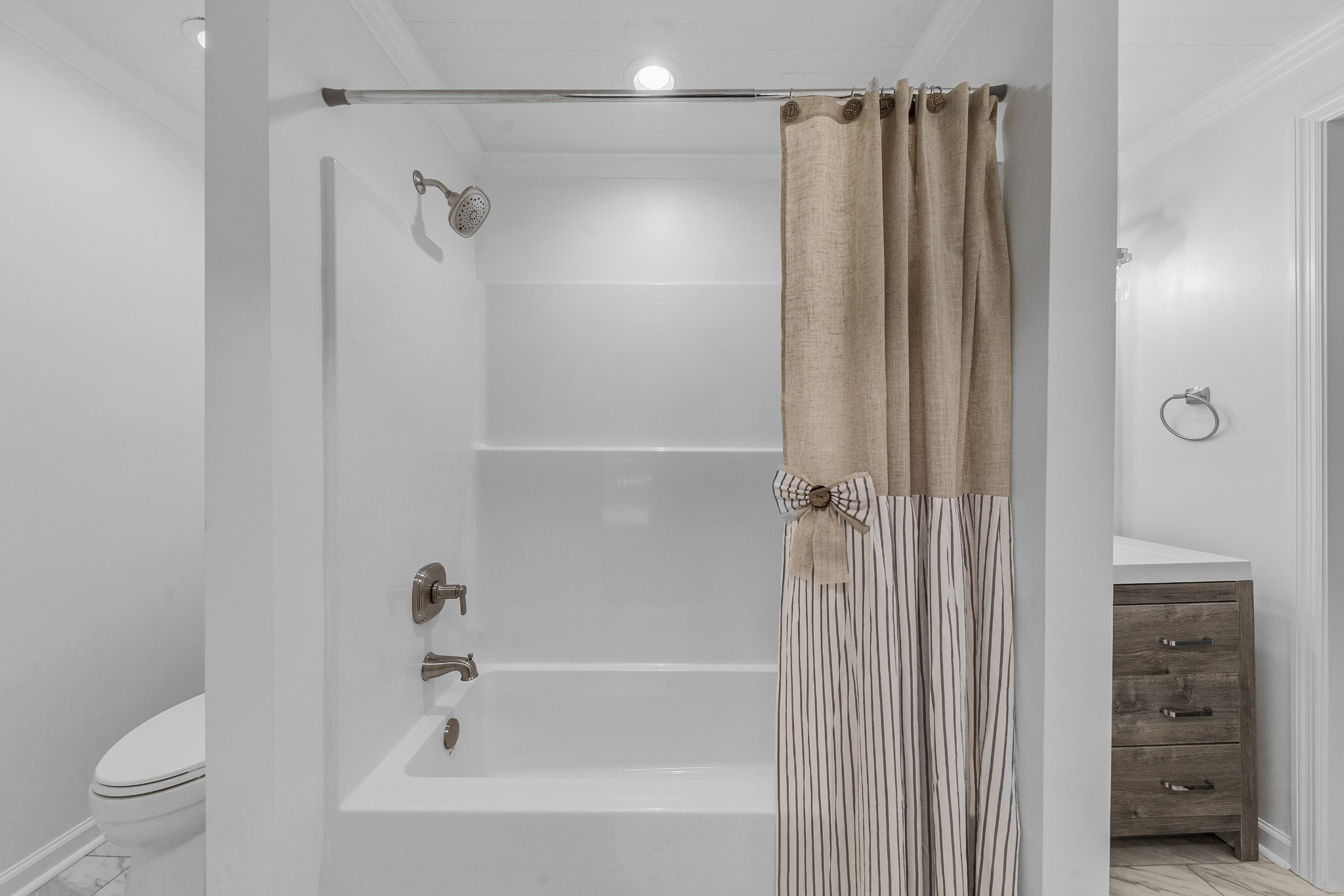 128 North Main Street Loretto, TN 38469 - Photo 27 of 32 a bathroom with a shower a toilet and a tub