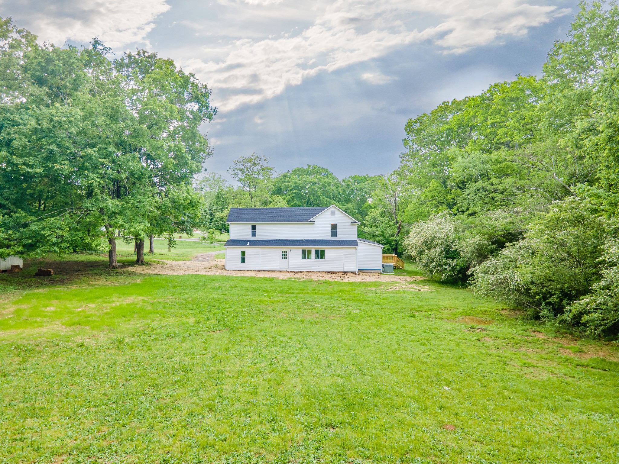 128 North Main Street Loretto, TN 38469 - Photo 5 of 32 a house view with a garden space