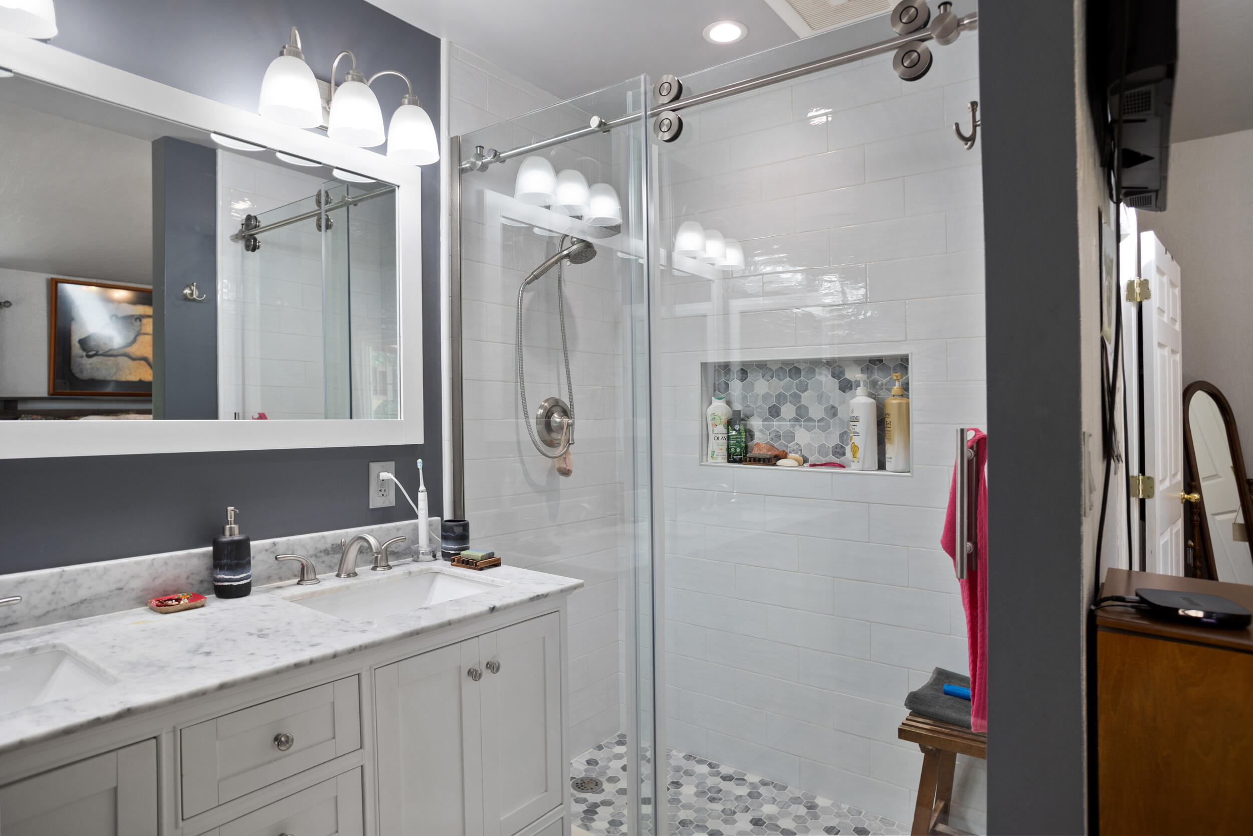 255 Queens Branch Road Rogue River, OR 97537 - Photo 20 of 60 a bathroom with a granite countertop sink a large mirror and a shower