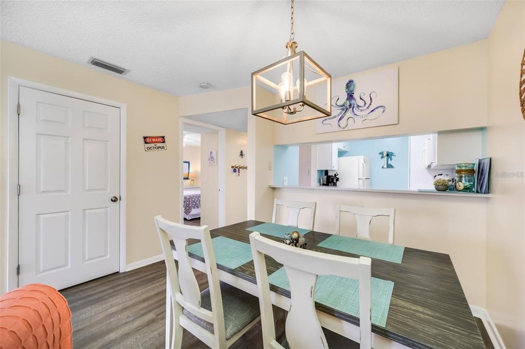 260 Medallion Boulevard, Unit F Madeira Beach, FL 33708 - Photo 8 of 29 a view of kitchen with breakfast area