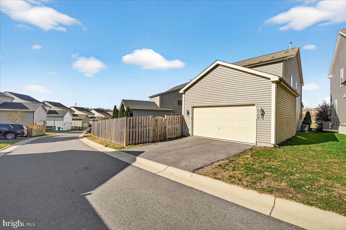 8509 Raptor Ridge Lane Frederick, MD 21704 - Photo 5 of 19 Attached garage & driveway