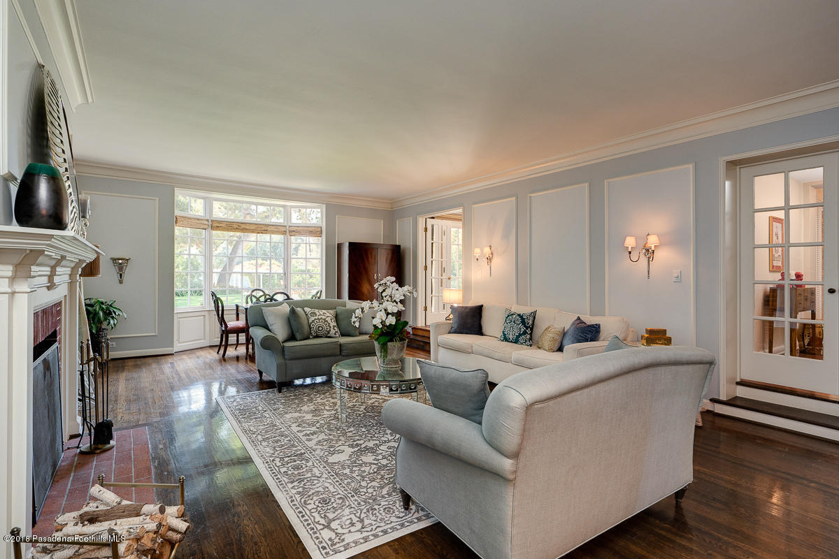 721 Madre Street Pasadena, CA 91107 - Photo 12 of 82 a living room with fireplace furniture and a large window