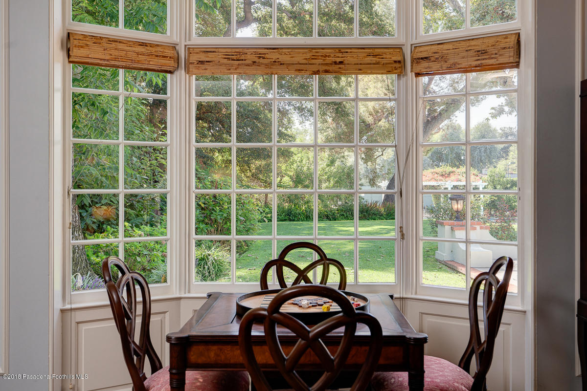 721 Madre Street Pasadena, CA 91107 - Photo 15 of 82 a view of a city from a dining room with large windows