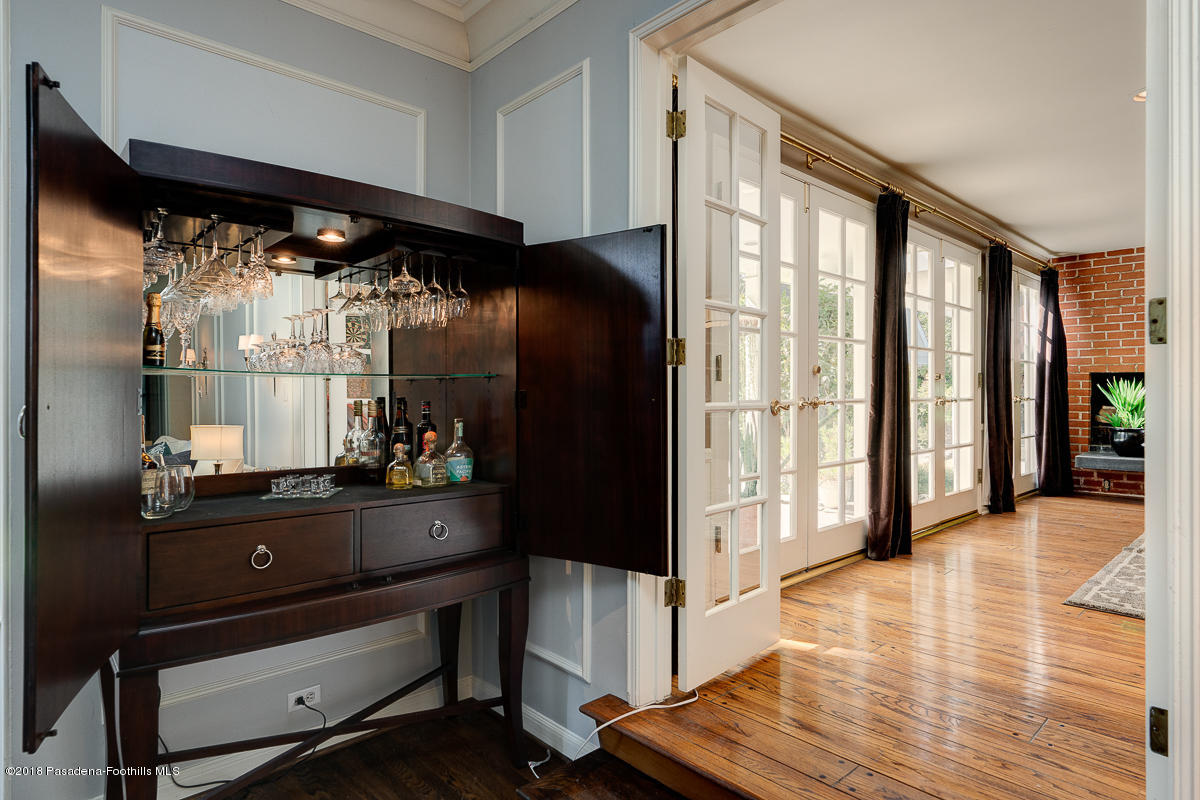 721 Madre Street Pasadena, CA 91107 - Photo 16 of 82 a room with wooden floor and furniture