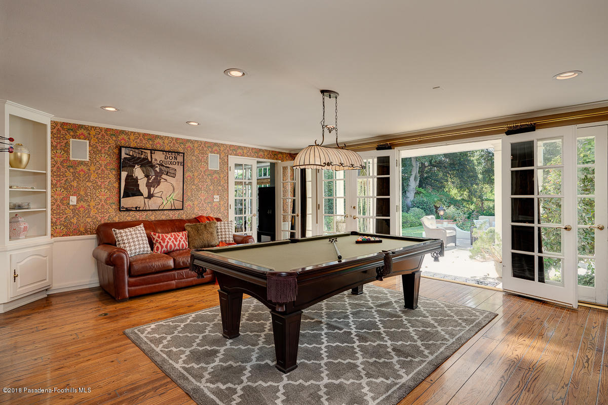 721 Madre Street Pasadena, CA 91107 - Photo 19 of 82 a living room with furniture a table and large window with wooden floor