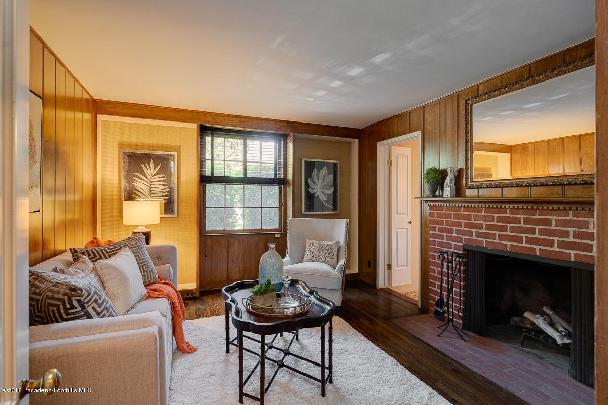 721 Madre Street Pasadena, CA 91107 - Photo 22 of 82 a living room with furniture and a fireplace