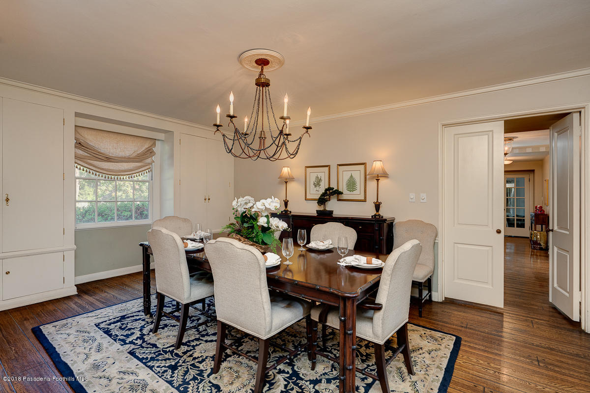 721 Madre Street Pasadena, CA 91107 - Photo 27 of 82 a view of a dining room with furniture a chandelier and wooden floor