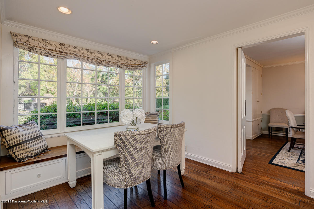 721 Madre Street Pasadena, CA 91107 - Photo 29 of 82 a view of a dining room with furniture a chandelier and wooden floor