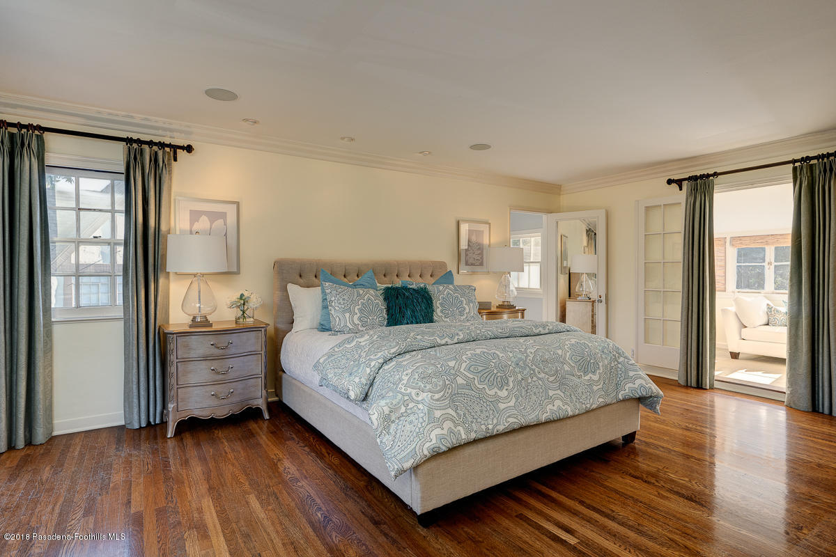 721 Madre Street Pasadena, CA 91107 - Photo 41 of 82 a bedroom with a large bed and wooden floor