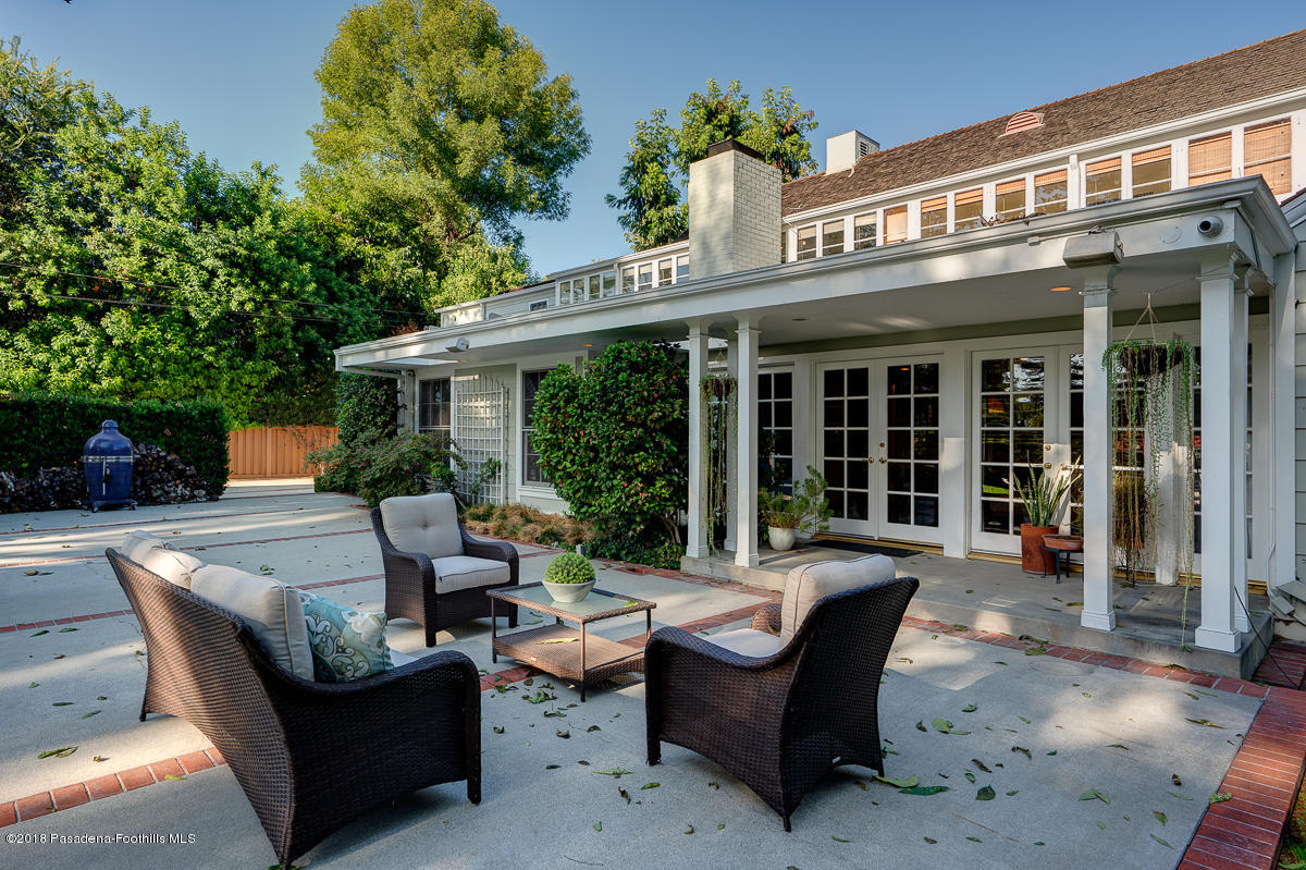 721 Madre Street Pasadena, CA 91107 - Photo 53 of 82 a view of a house with a patio and a yard