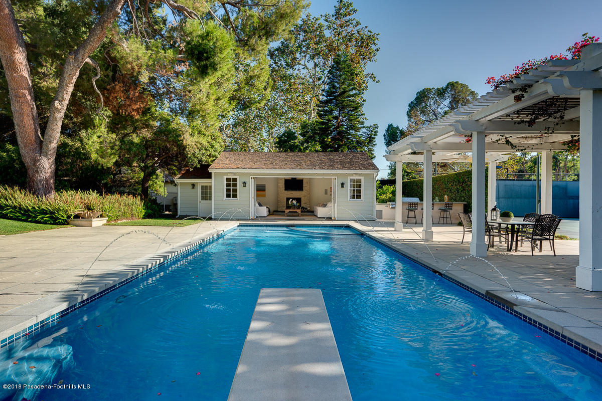 721 Madre Street Pasadena, CA 91107 - Photo 63 of 82 a swimming pool view with a seating space and a garden