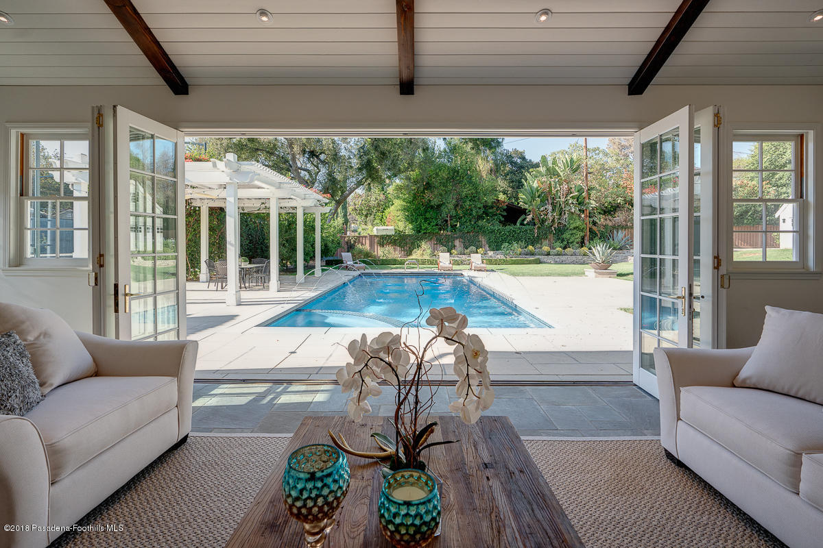 721 Madre Street Pasadena, CA 91107 - Photo 69 of 82 a living room with furniture and a floor to ceiling window