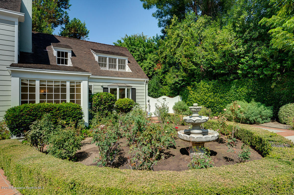 721 Madre Street Pasadena, CA 91107 - Photo 8 of 82 a view of a backyard with plants and lake view