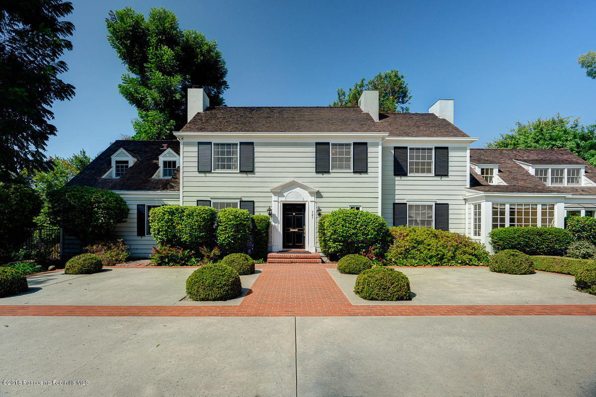 721 Madre Street Pasadena, CA 91107 - Photo 10 of 82 a front view of a house with a yard