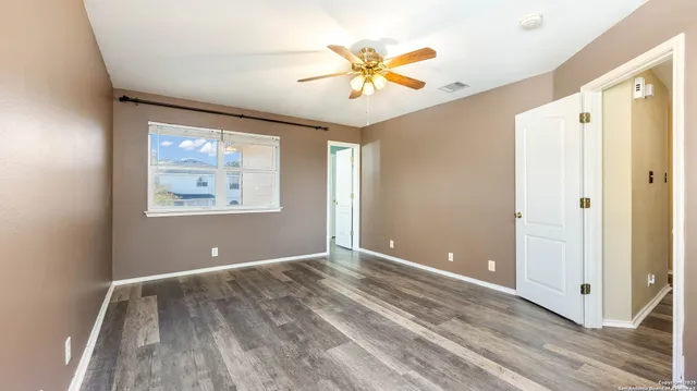 an empty room and window