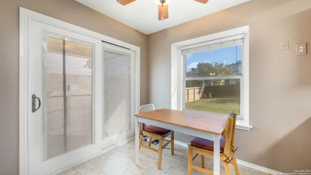 a room with furniture and a window