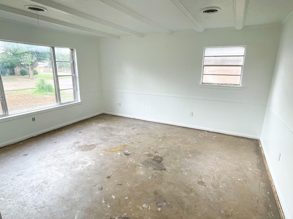 5503 36th Street Lubbock, TX 79407 - Photo 9 of 15 an empty room with a window