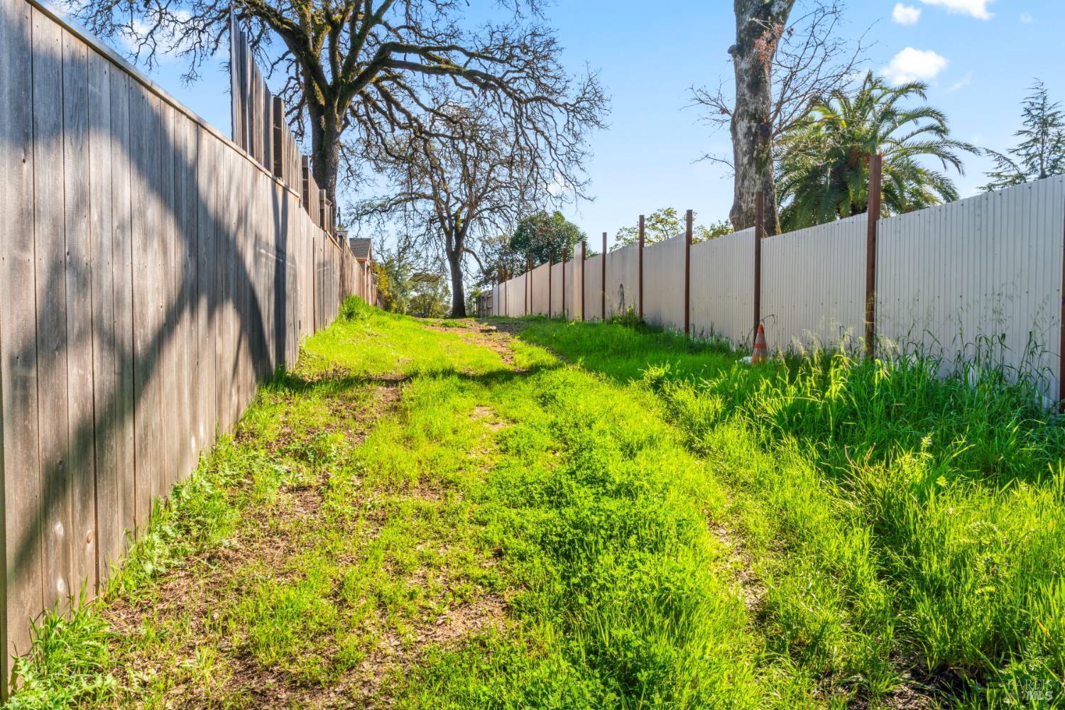 18446 1st Avenue Sonoma, CA 95476 - Photo 7 of 8 a view of a yard with flower plants