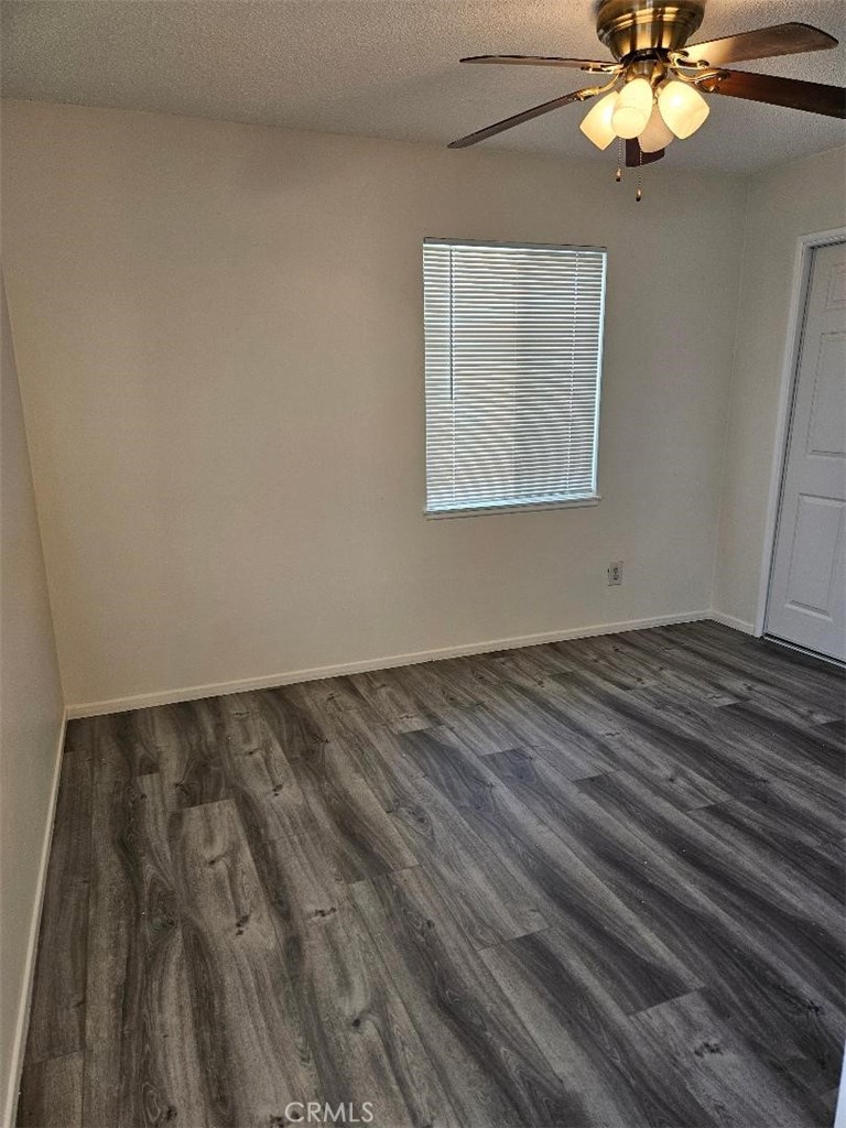 12627 Longleaf Drive La Mirada, CA 90638 - Photo 11 of 19 wooden floor in an empty room with a window