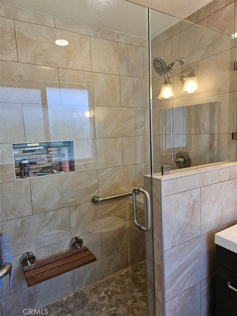 12627 Longleaf Drive La Mirada, CA 90638 - Photo 14 of 19 a bathroom with a shower
