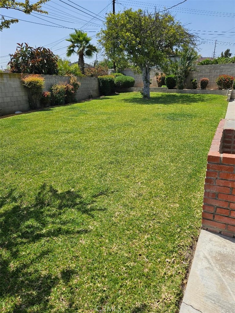 12627 Longleaf Drive La Mirada, CA 90638 - Photo 15 of 19 a view of a garden with houses