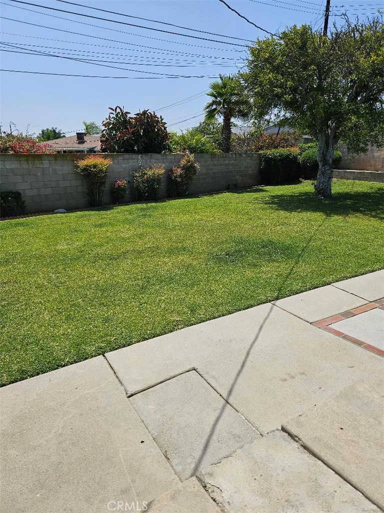 12627 Longleaf Drive La Mirada, CA 90638 - Photo 18 of 19 a view of a garden and basketball court