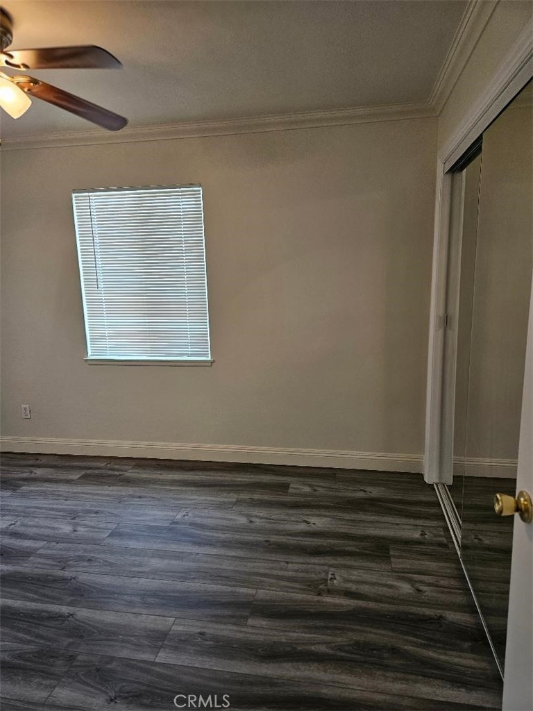 12627 Longleaf Drive La Mirada, CA 90638 - Photo 10 of 19 a view of an empty room with wooden floor and a window