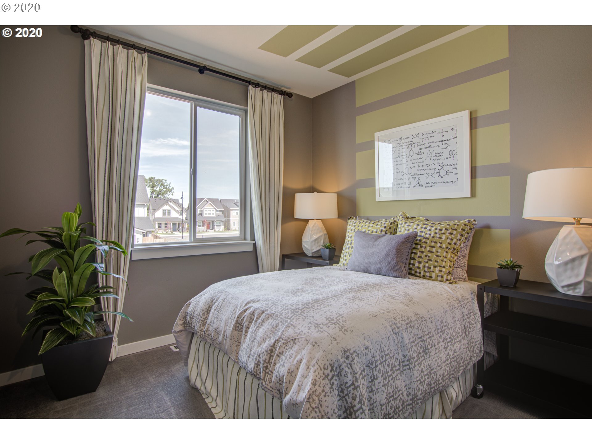 8247 Southeast Kinnaman Road Hillsboro, OR 97123 - Photo 13 of 26 a bedroom with a bed potted plant and a window
