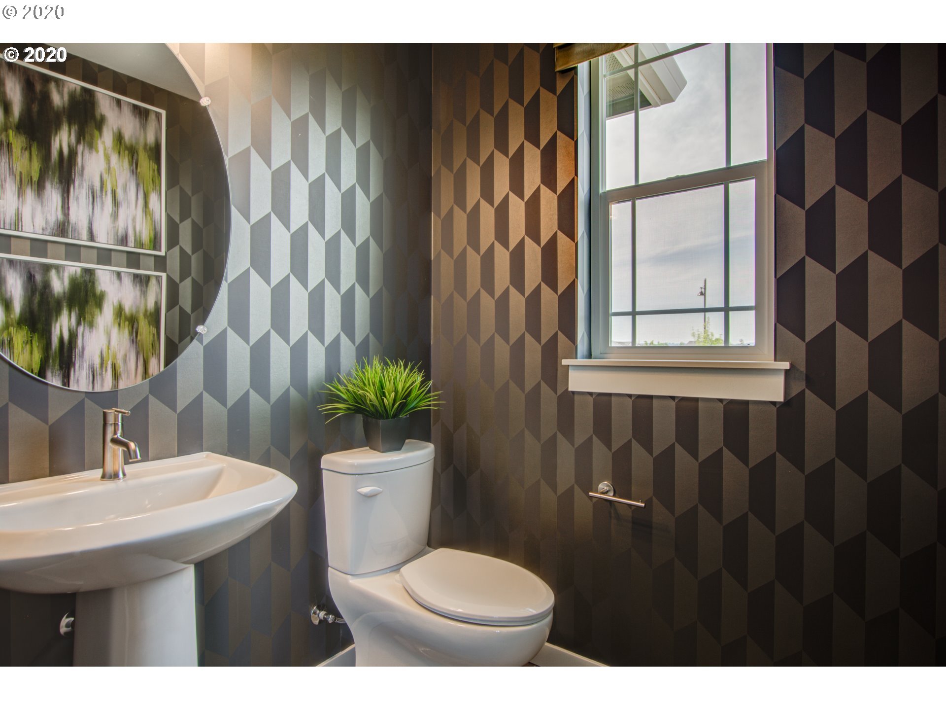8247 Southeast Kinnaman Road Hillsboro, OR 97123 - Photo 10 of 26 a bathroom with a sink and mirror with toilet