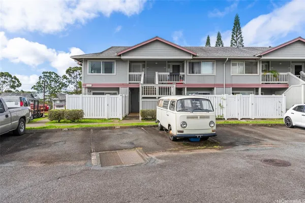 a car parked in front of a house
