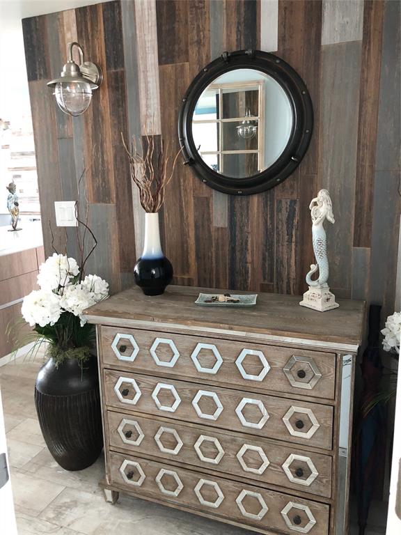 333 Northeast 21st Avenue, Unit 1216 Deerfield Beach, FL 33441 - Photo 10 of 19 a table with a stove and a vase