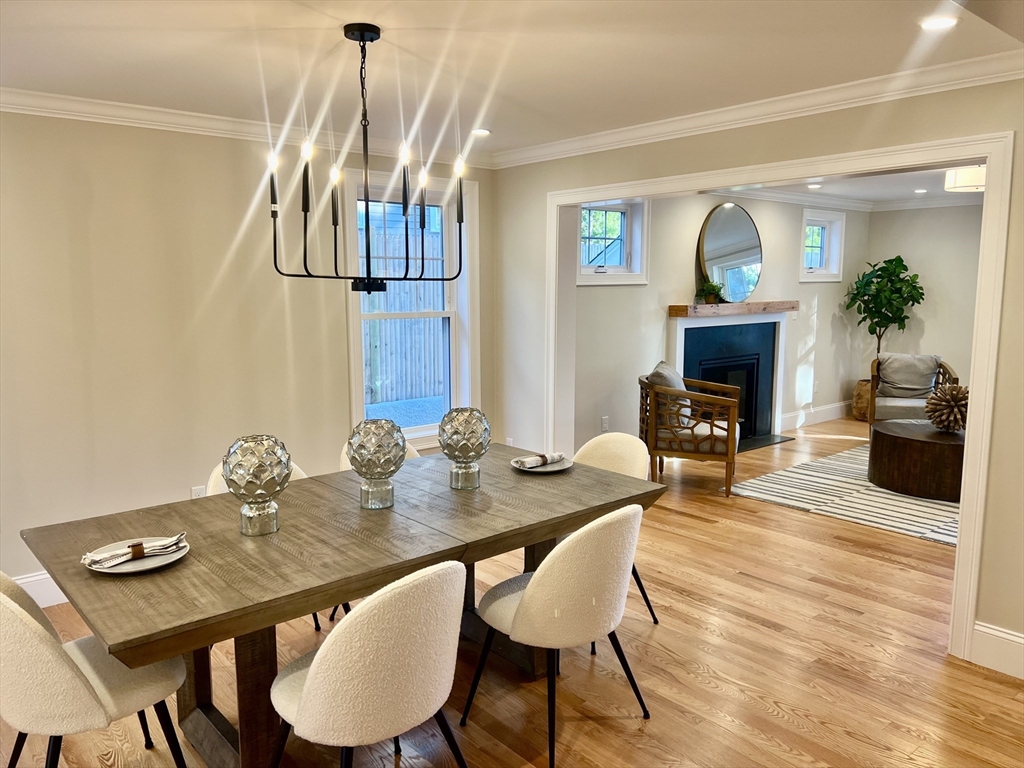 88 Hillcrest Road Waltham, MA 02451 - Photo 7 of 39 a view of a dining room with furniture and a chandelier