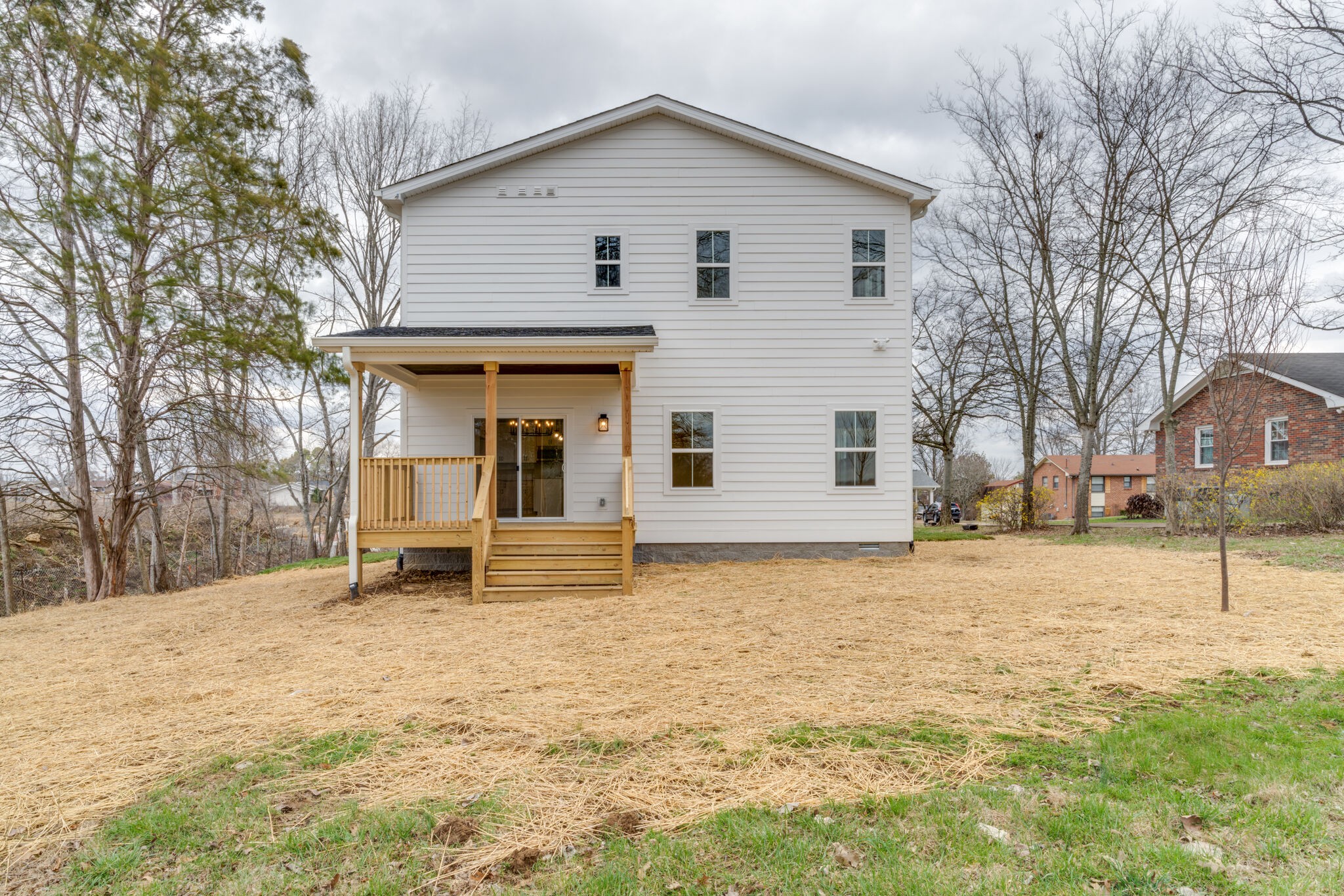1206 Apache Lane Madison, TN 37115 - Photo 37 of 39 a view of a house with a yard covered in snow