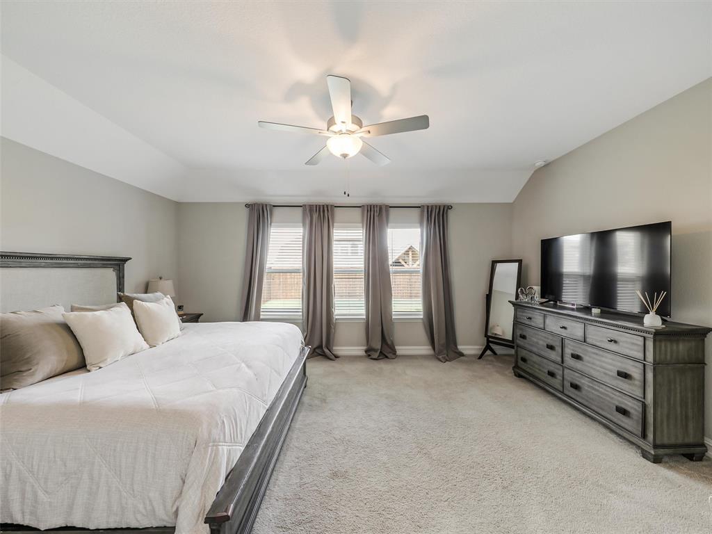 2809 Ranger Lane Aubrey, TX 76227 - Photo 17 of 34 Primary Bedroom with High Ceilings and Tons of Space.