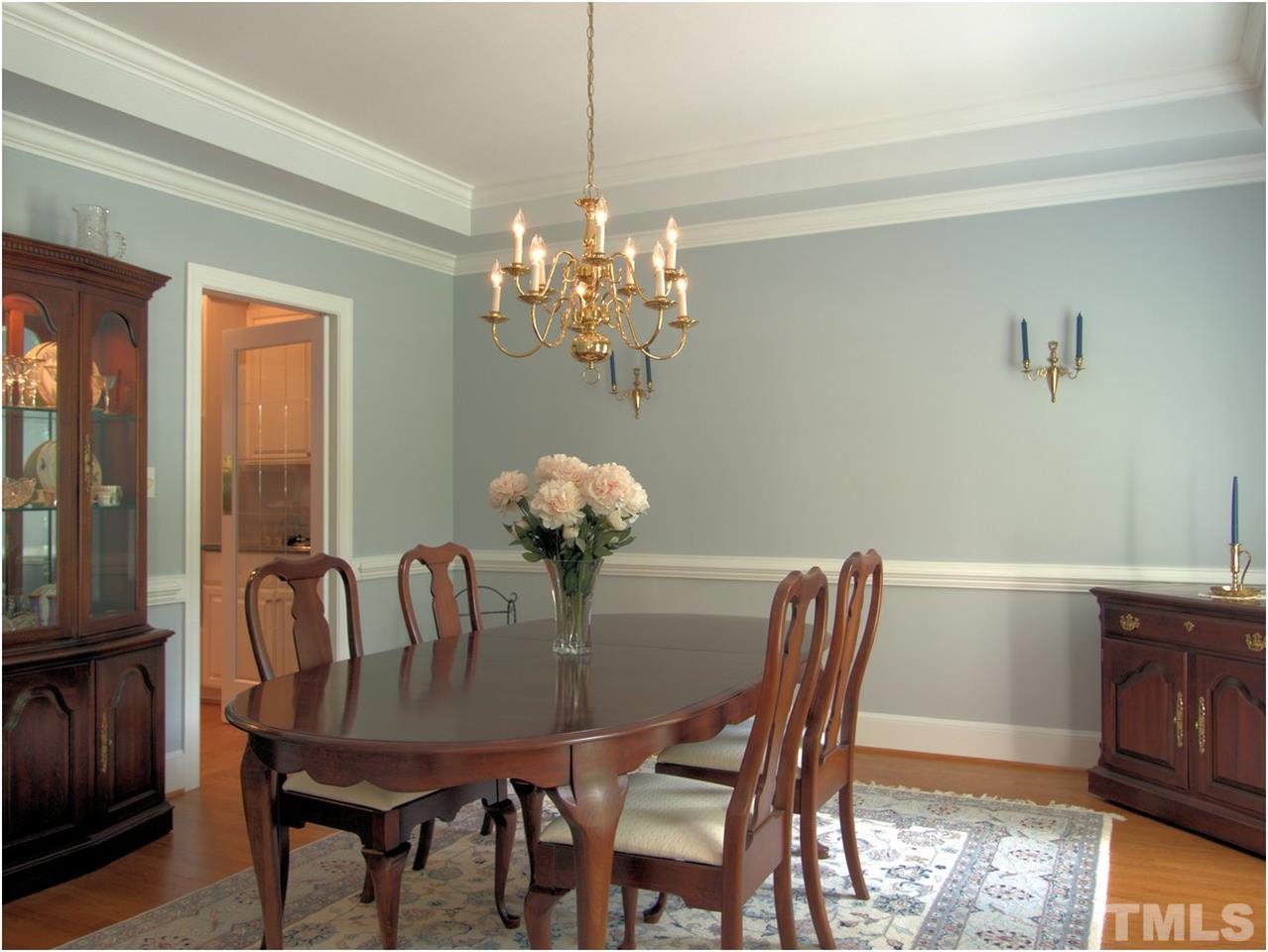 9021 Hemingwood Court Raleigh, NC 27613 - Photo 8 of 25 a view of a dining room with furniture window and outside view
